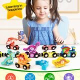 A young girl playing with a wooden dinosaur train set on a white table, highlighting cognitive skills, logical thinking, and hand-eye coordination benefits.